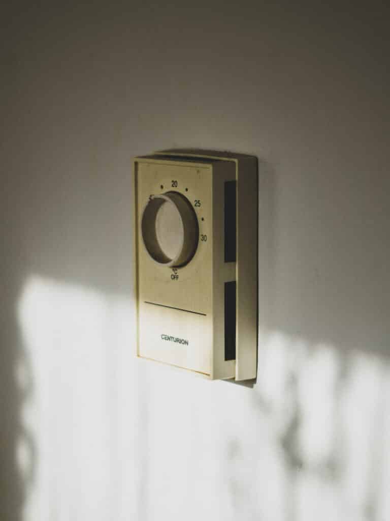 beige Centurion home appliance controller on wall